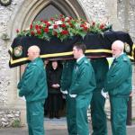 Pall Bearers Leaving Church.