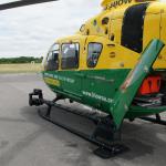 The stretcher can be unloaded from the rear of the aircraft.