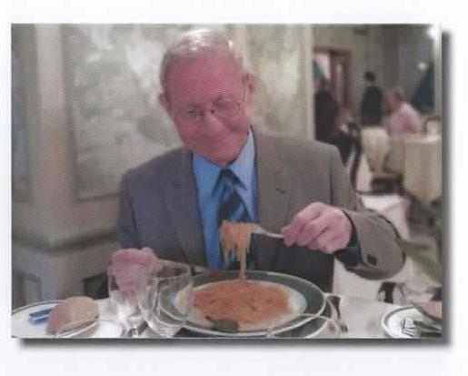 Peter enjoying a meal during retirement.