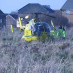 Patient being loaded on to the helicopter.