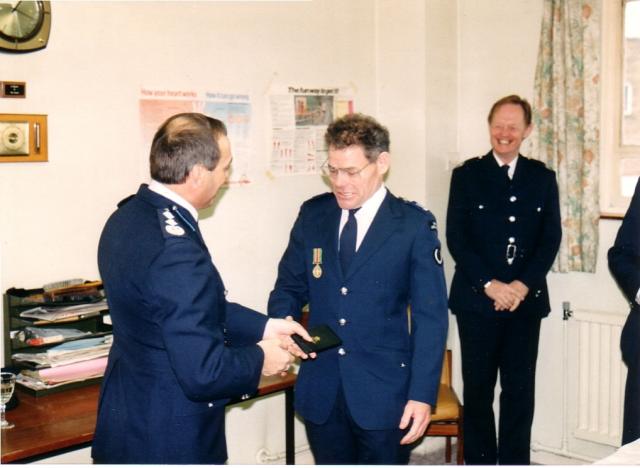 Brian Fairclough receives his medal.