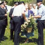 Mike 'Lofty' Robertson Presents Flowers to Sue Saville.