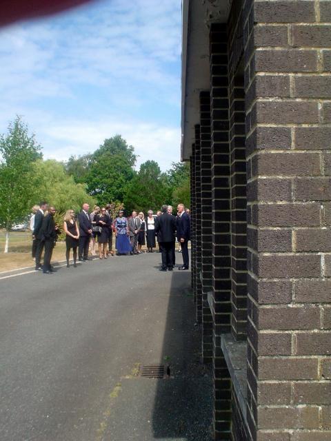 Mourners Arrive.