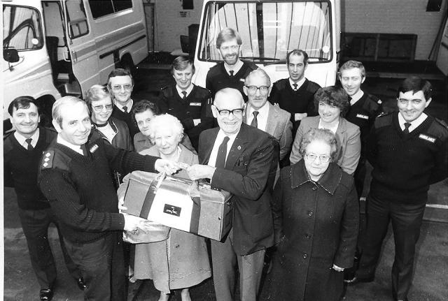 Pete Goater receives some donated equipment.