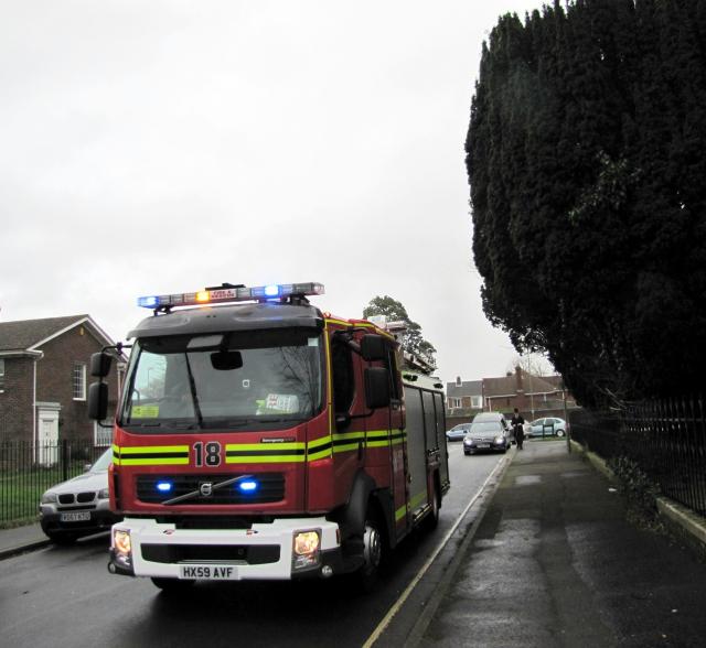 Fire Engine Escorts the Hearse.