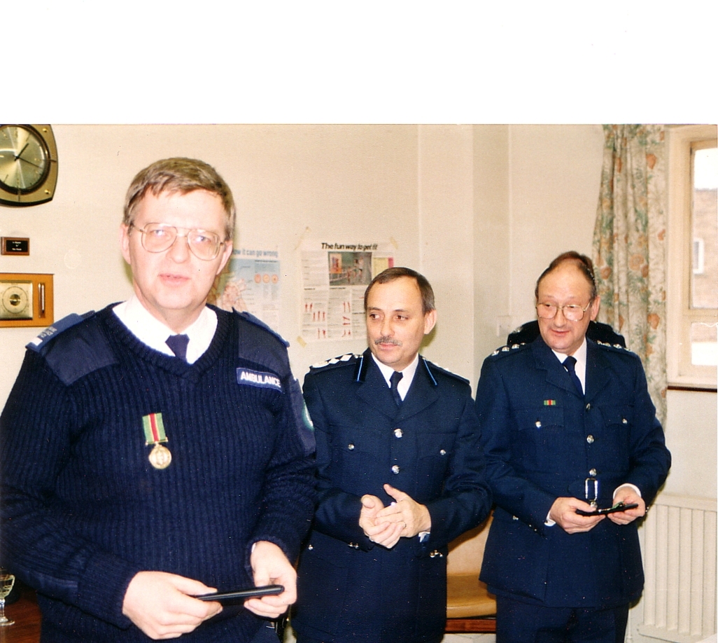 Andy Bartlett receives his medal.